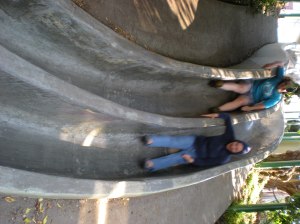 We literally played Chutes and Ladders! :-) Monica took me on a secret tour of her old neighborhood with secret stairs AND this awesome slide between two streets! Totally fun! :-)